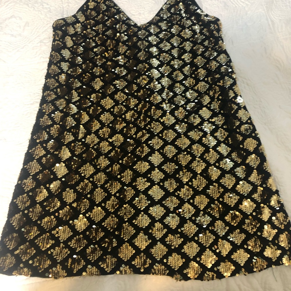 Black and gold sequin dress